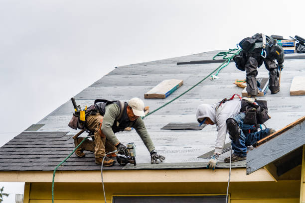 Professional Gutter Installation technician working in Claremont, NH